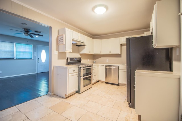 kitchen featuring ornamental molding, appliances with stainless steel finishes, and white cabinets