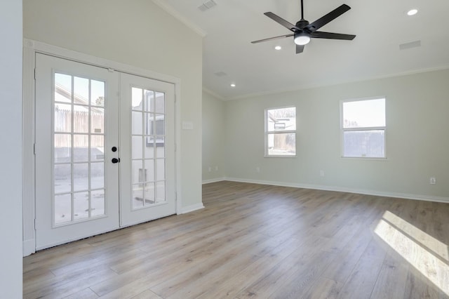 interior space with crown molding, light hardwood / wood-style flooring, french doors, and ceiling fan