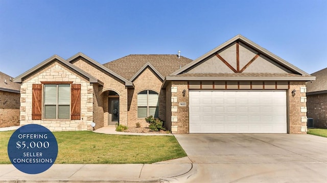 view of front facade featuring a garage and a front yard