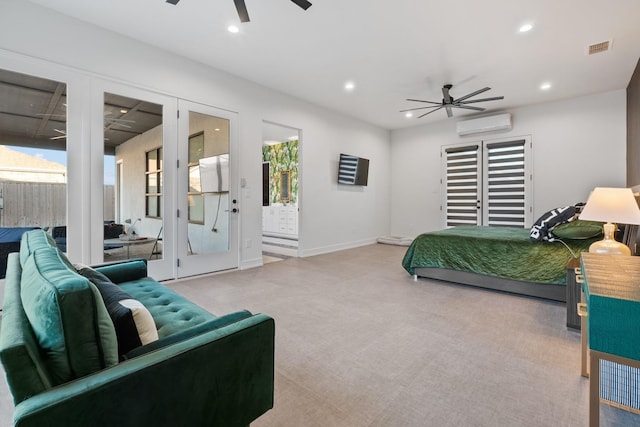 bedroom featuring multiple windows, ceiling fan, and a wall mounted AC