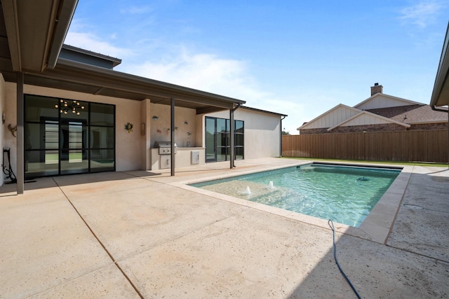 view of swimming pool with a patio area