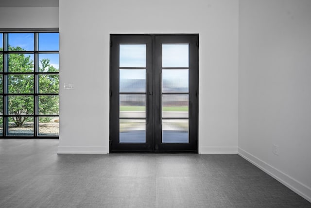 doorway featuring a wealth of natural light and french doors