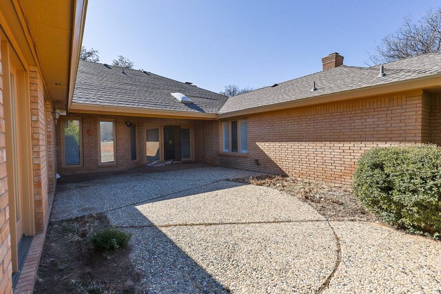 back of house featuring a patio