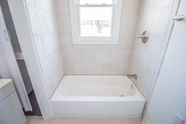 bathroom with tile patterned flooring, vanity, and shower / bathing tub combination