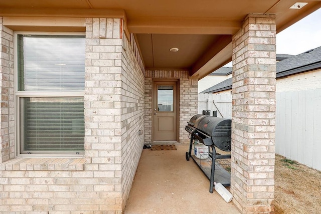 property entrance with a patio