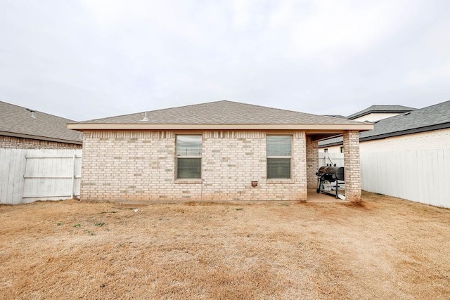 rear view of house with a patio area