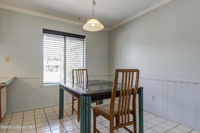 3312 86th St, Lubbock, TX 79423 - dining area with a wainscoted wall, light tile patterned flooring, and ornamental molding