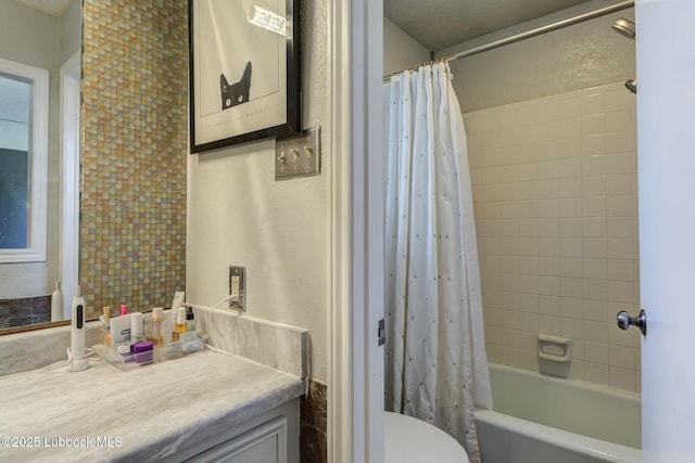 3312 86th St, Lubbock, TX 79423 - bathroom featuring vanity, toilet, and shower / bath combo with shower curtain