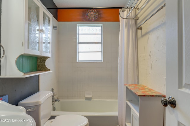 3312 86th St, Lubbock, TX 79423 - bathroom featuring toilet and shower / tub combo