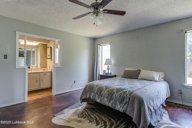 3312 86th St, Lubbock, TX 79423 - bedroom with concrete floors, a textured ceiling, multiple windows, ensuite bath, and a ceiling fan