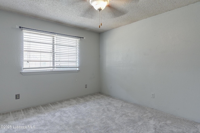 3312 86th St, Lubbock, TX 79423 - spare room with carpet flooring, ceiling fan, and a textured ceiling