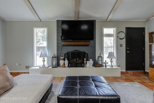 3312 86th St, Lubbock, TX 79423 - tiled living room with beam ceiling, a brick fireplace, a textured ceiling, and baseboards