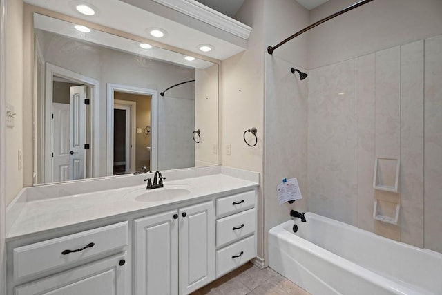 bathroom featuring vanity, tile patterned flooring, and shower / bath combination