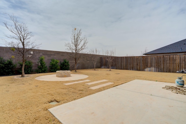 3713 128th St, Lubbock, TX 79423 - fenced backyard with a patio area
