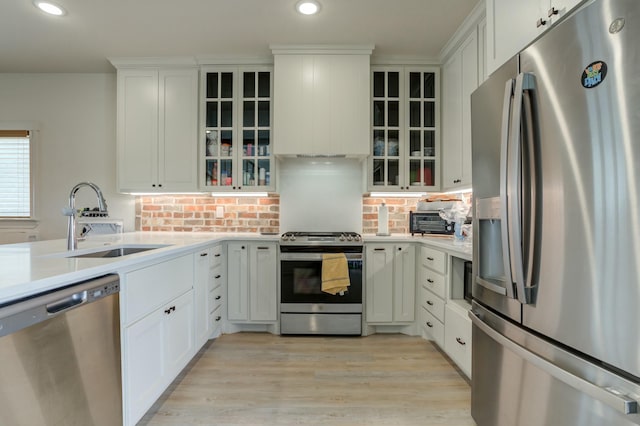 3713 128th St, Lubbock, TX 79423 - kitchen with stainless steel appliances, light countertops, recessed lighting, decorative backsplash, and white cabinets