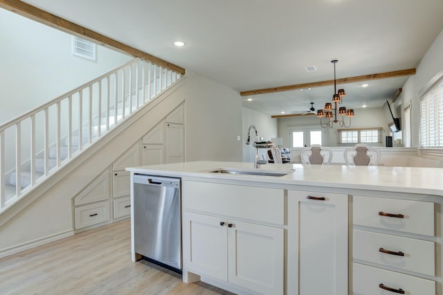3713 128th St, Lubbock, TX 79423 - kitchen with dishwasher, white cabinetry, healthy amount of natural light, recessed lighting, and light wood-style floors