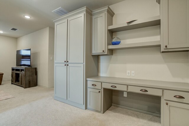 3713 128th St, Lubbock, TX 79423 - kitchen featuring built in desk, light colored carpet, light countertops, open shelves, and recessed lighting
