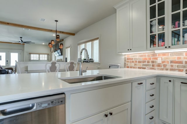 3713 128th St, Lubbock, TX 79423 - kitchen with dishwasher, light countertops, healthy amount of natural light, and beam ceiling