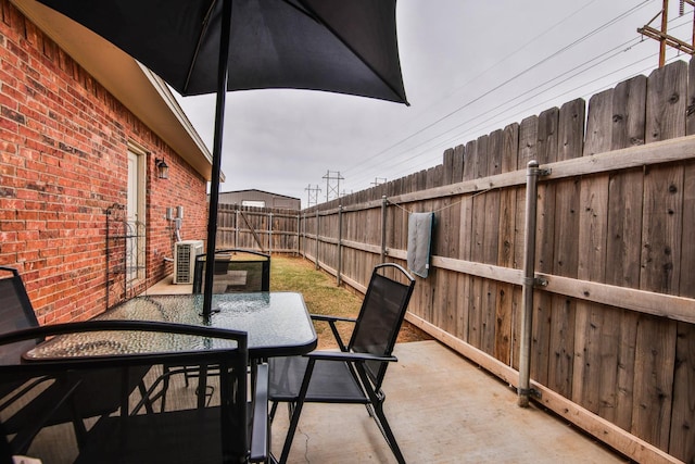 view of patio featuring central AC unit