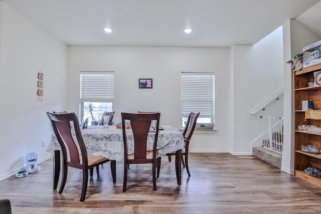 dining area featuring hardwood / wood-style flooring