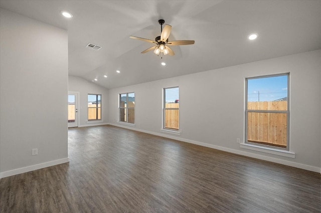 unfurnished room with dark wood-type flooring, vaulted ceiling, and ceiling fan