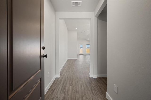 hall featuring dark hardwood / wood-style floors