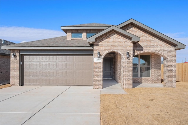 view of front of home with a garage