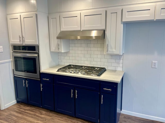 kitchen featuring appliances with stainless steel finishes and white cabinets