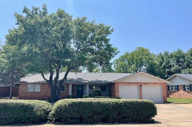 single story home with a garage