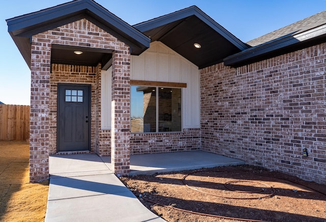 entrance to property featuring a patio