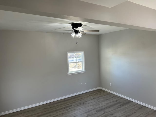 spare room featuring hardwood / wood-style floors and ceiling fan