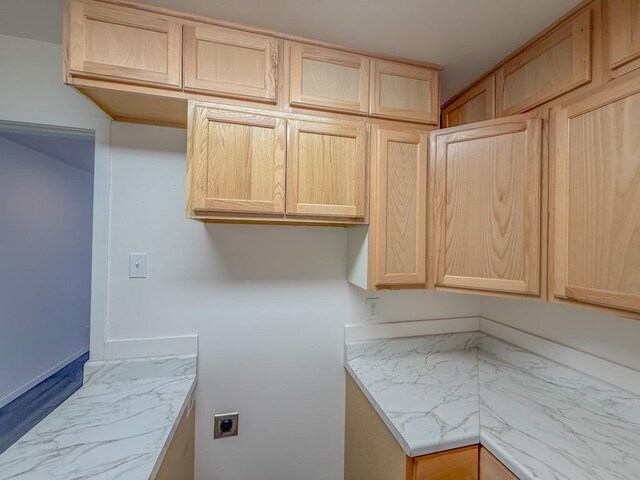 kitchen featuring light brown cabinets