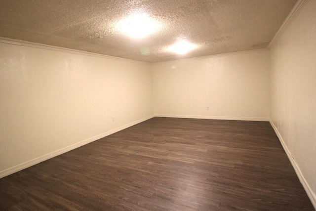 unfurnished room featuring crown molding, dark hardwood / wood-style floors, and a textured ceiling