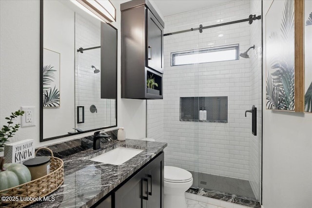 9105 Kewanee Ave, Lubbock, TX 79424 - full bath featuring vanity, a stall shower, toilet, and marble finish floors