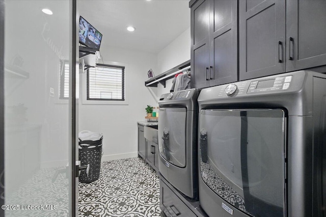 9105 Kewanee Ave, Lubbock, TX 79424 - laundry area with cabinet space, independent washer and dryer, baseboards, light tile patterned floors, and recessed lighting