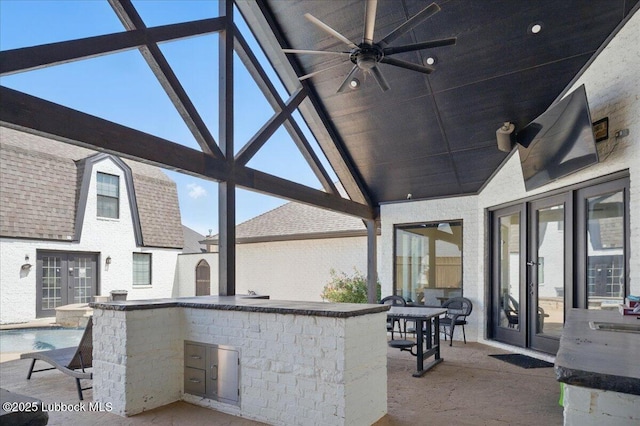 9105 Kewanee Ave, Lubbock, TX 79424 - view of patio / terrace featuring french doors, an outdoor kitchen, a ceiling fan, and an outdoor pool