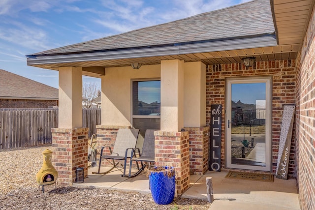 property entrance with a patio