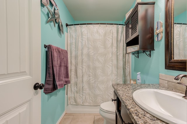 full bathroom featuring tile patterned floors, toilet, vanity, and shower / bath combo