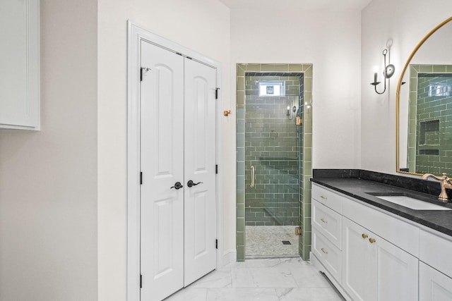 bathroom with vanity and walk in shower