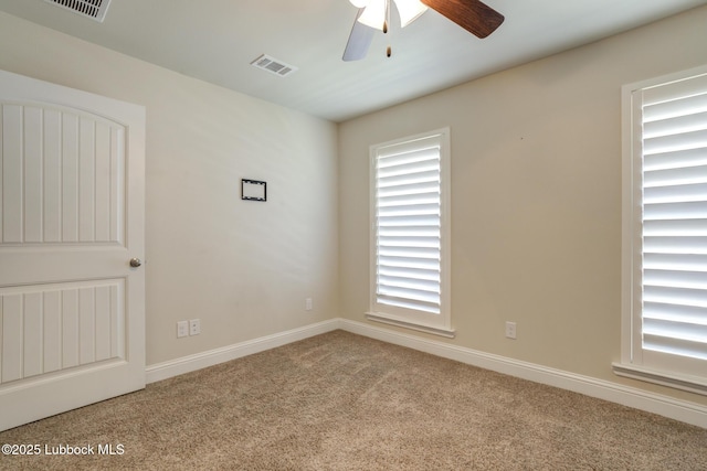 7204 90th St, Lubbock, TX 79424 - unfurnished room featuring carpet, ceiling fan, plenty of natural light, and baseboards