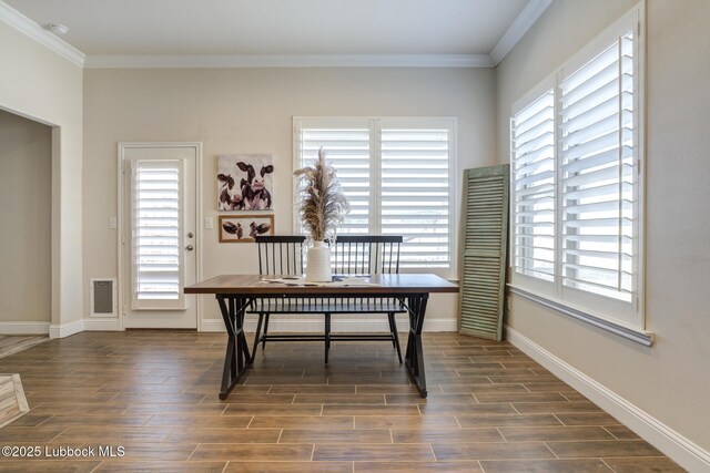 7204 90th St, Lubbock, TX 79424 - office area featuring dark wood-type flooring, crown molding, and baseboards