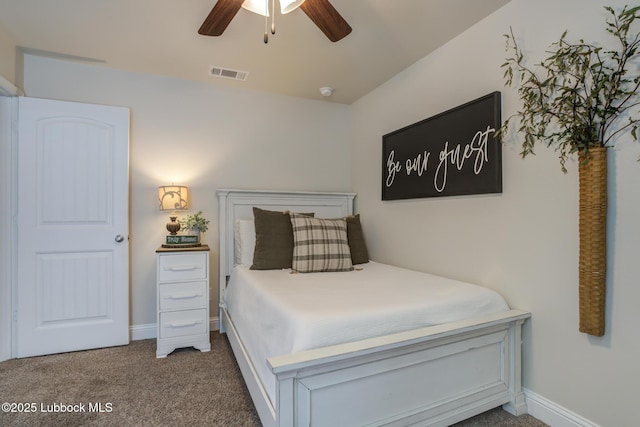 7204 90th St, Lubbock, TX 79424 - carpeted bedroom featuring baseboards and a ceiling fan