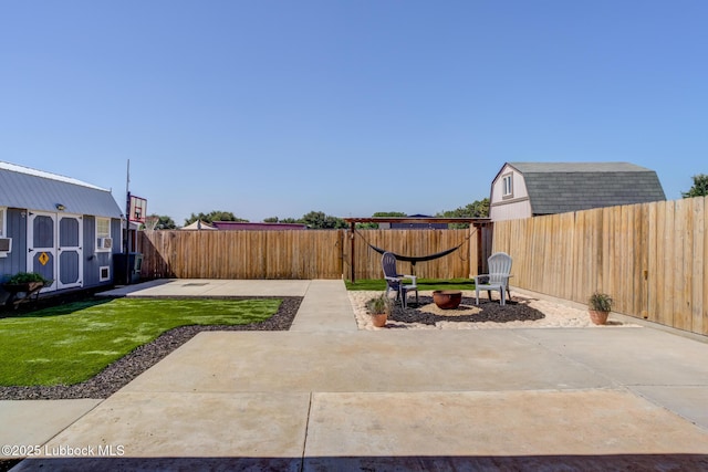 7204 90th St, Lubbock, TX 79424 - view of patio / terrace featuring a fire pit