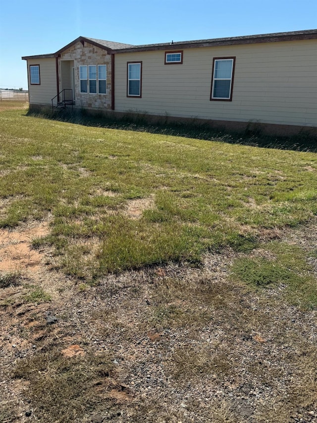 exterior space featuring a lawn
