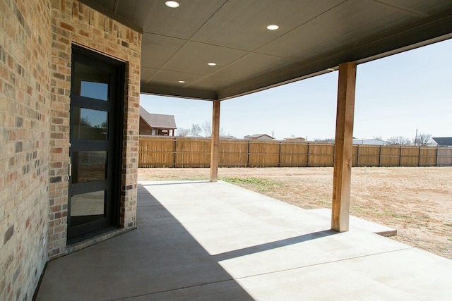 7211 W 12th St, Plainview, TX 79072 - fenced backyard featuring a patio area