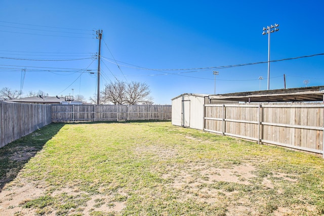 view of yard with a storage shed