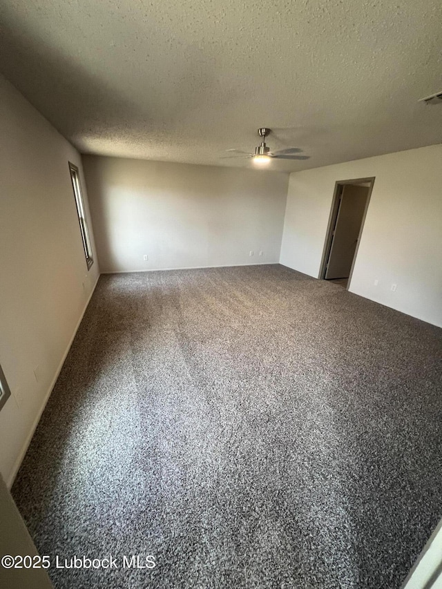 3535 W State Rd 300, Levelland, TX 79336 - carpeted empty room featuring a ceiling fan and a textured ceiling