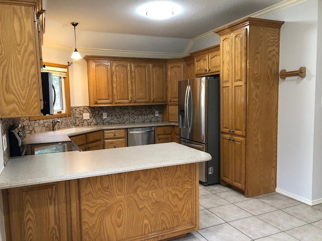 kitchen featuring pendant lighting, light tile patterned floors, stainless steel appliances, ornamental molding, and kitchen peninsula