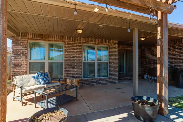 9207 Trenton Ave, Lubbock, TX 79424 - view of patio featuring an outdoor living space
