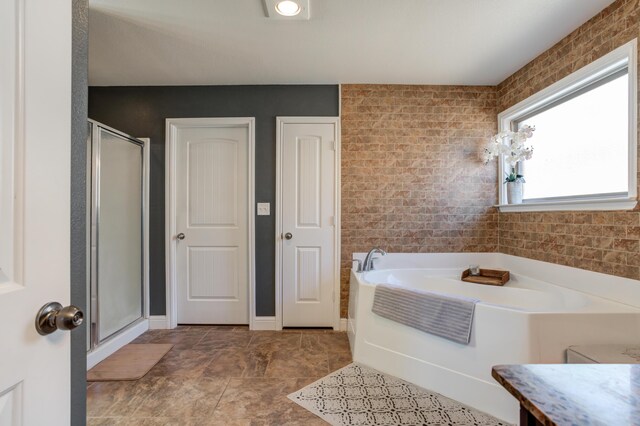 9207 Trenton Ave, Lubbock, TX 79424 - full bathroom with a stall shower and a bath
